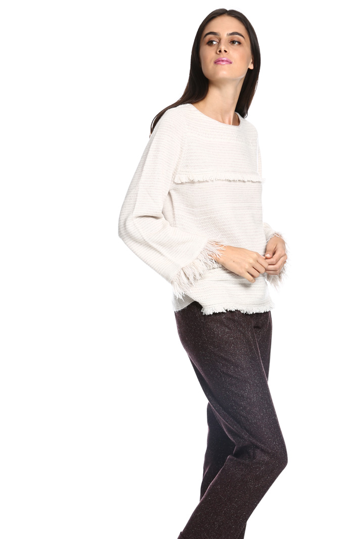 Maglia con piume e frange Diffusione Tessile Maglia con piume e frange Diffusione Tessile