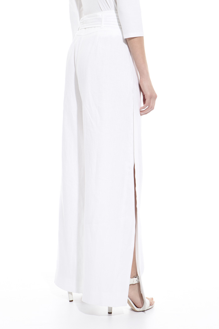 Wide trousers with slits Intrend Wide trousers with slits Intrend