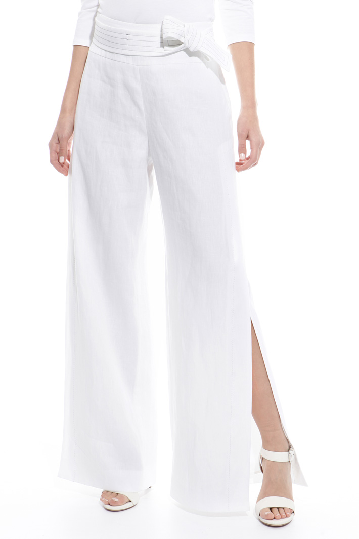 Wide trousers with slits Intrend Wide trousers with slits Intrend