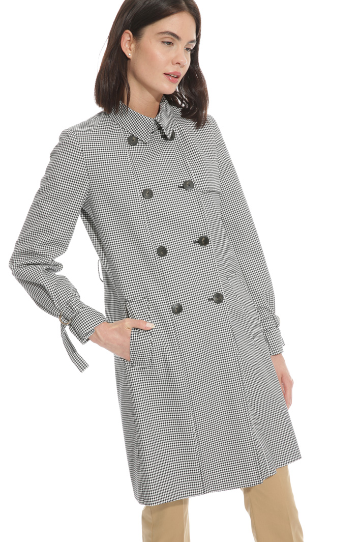 Trench in vichy fabric
Intrend Trench in vichy fabric
Intrend