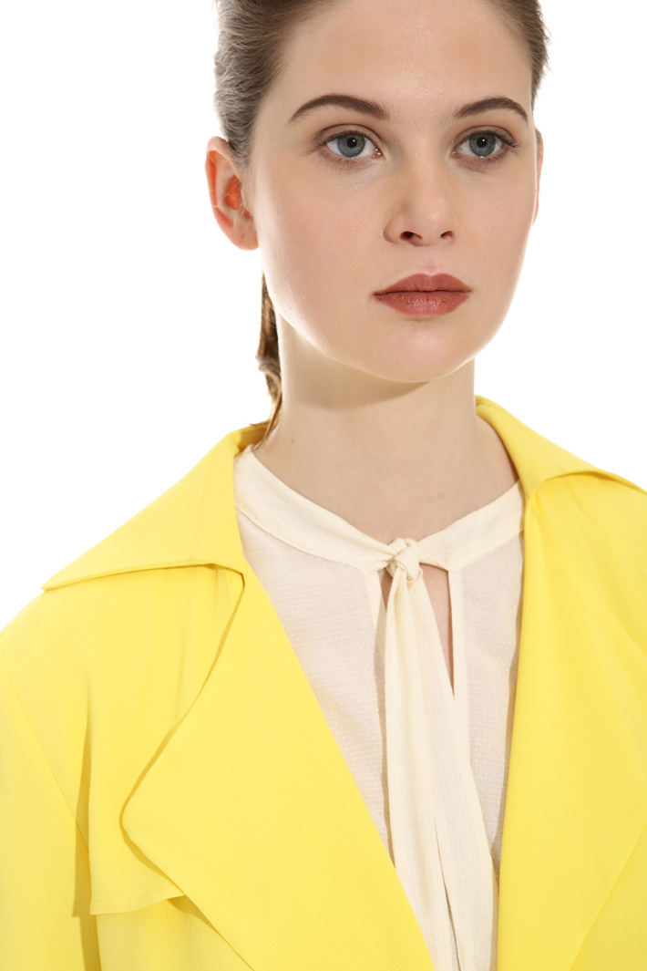 Crepe fabric duster coat
Intrend Crepe fabric duster coat
Intrend