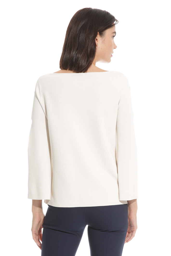 Flared sweater with openings
Intrend Flared sweater with openings
Intrend