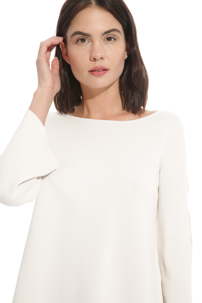 Flared sweater with openings
Intrend Flared sweater with openings
Intrend