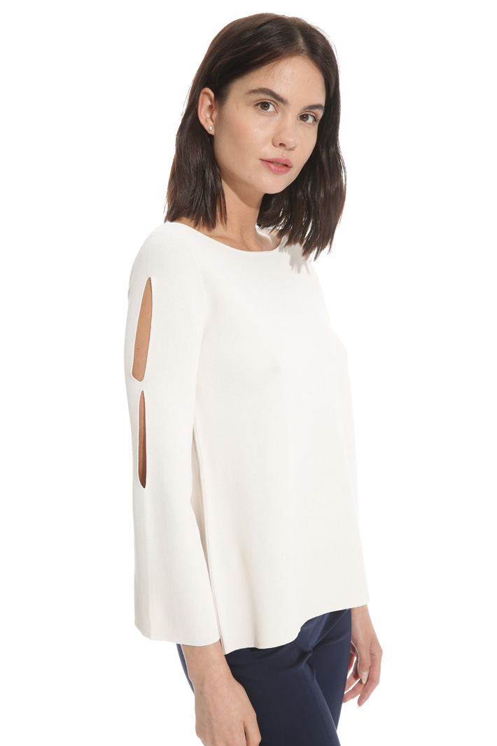 Flared sweater with openings
Intrend Flared sweater with openings
Intrend