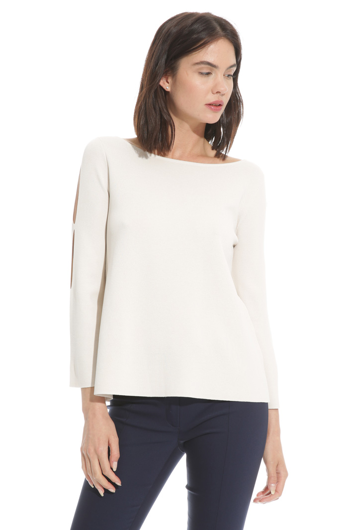 Flared sweater with openings
Intrend Flared sweater with openings
Intrend