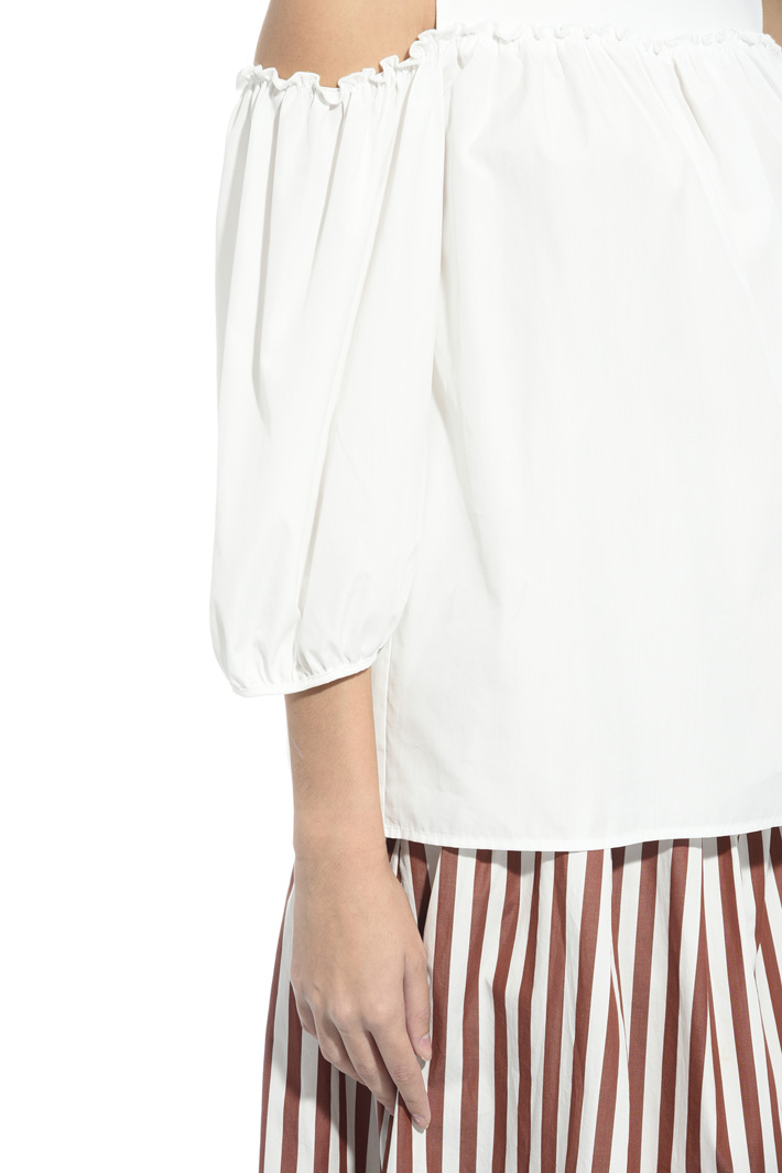 Top con spalle scoperte Intrend Top con spalle scoperte Intrend