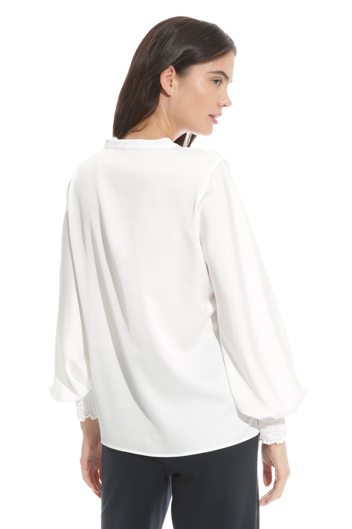 Blusa con polsini punto smock Blusa con polsini punto smock