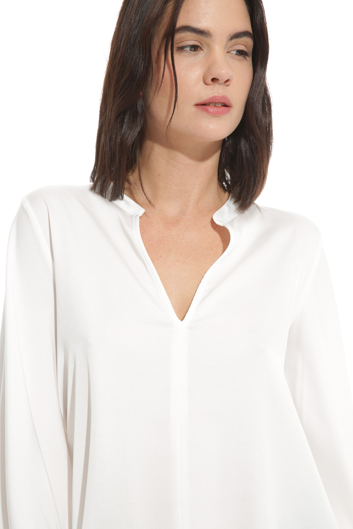 Blusa con polsini punto smock Blusa con polsini punto smock
