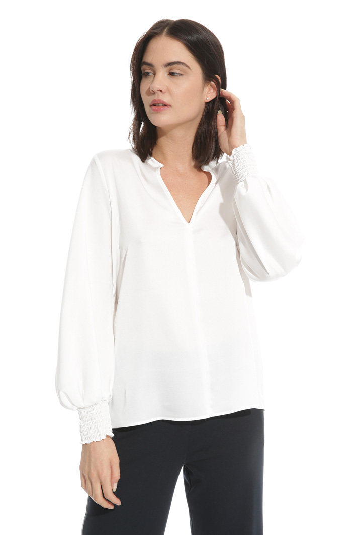 Blusa con polsini punto smock Blusa con polsini punto smock