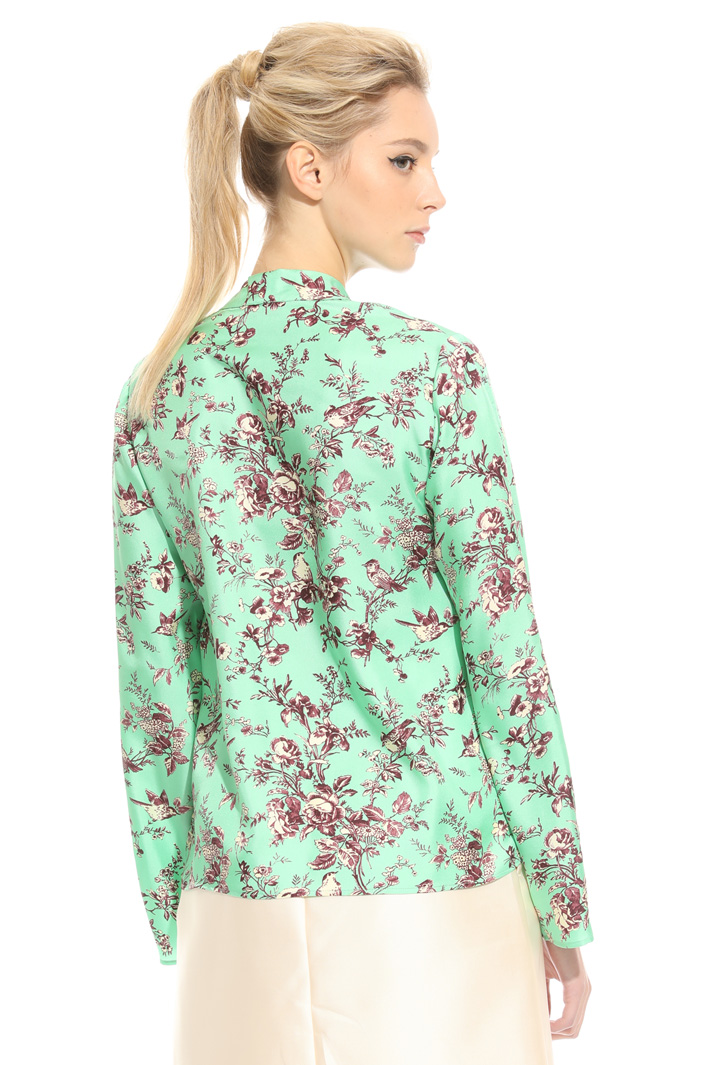 Scarf-neck blouse
Intrend Scarf-neck blouse
Intrend