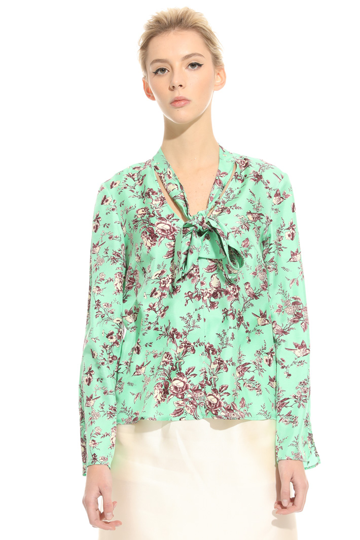 Scarf-neck blouse
Intrend Scarf-neck blouse
Intrend