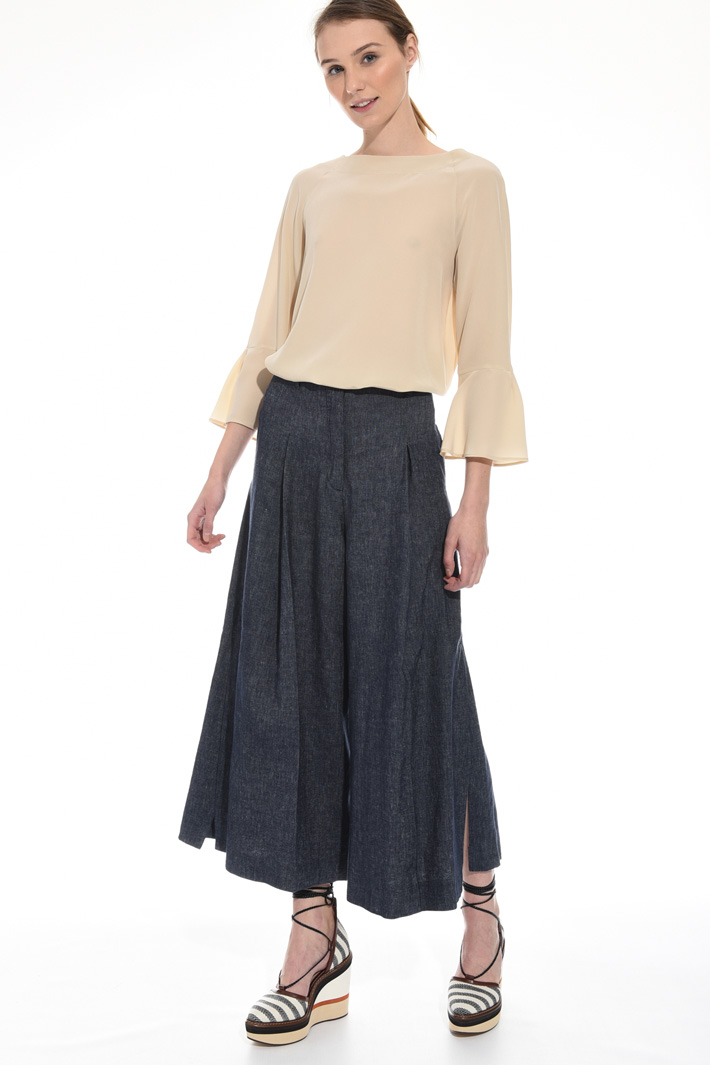 Wide trousers with splits
Intrend Wide trousers with splits
Intrend