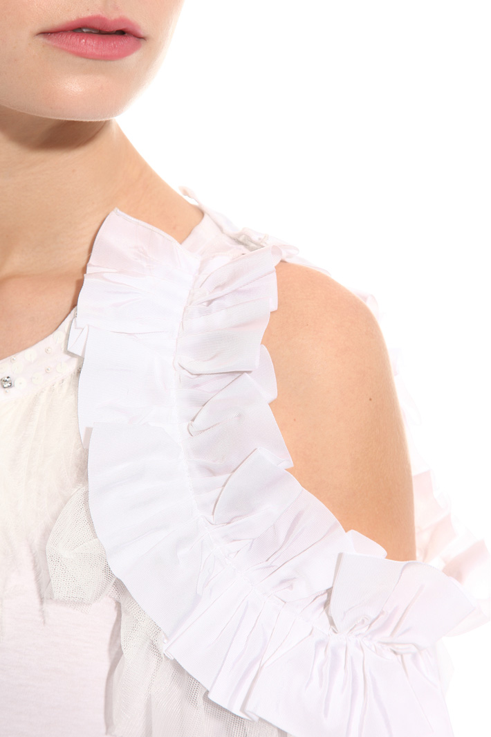 Top con collo gioiello e piume Intrend Top con collo gioiello e piume Intrend