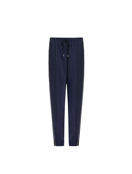 Pantaloni jogging con impunture a contrasto