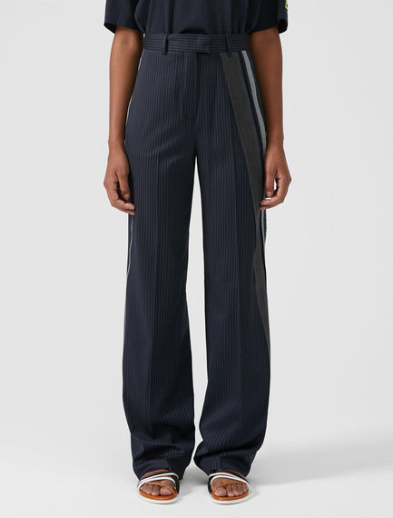 Pantalone con banda asimmetrica