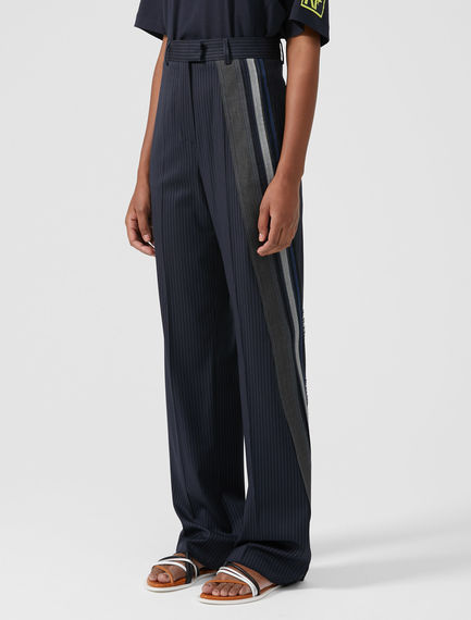 Pantalone con banda asimmetrica