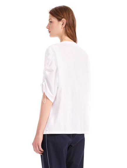 T-shirt con coulisse sulle spalle